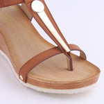 Fashionable sandal with metal and Velcro closure